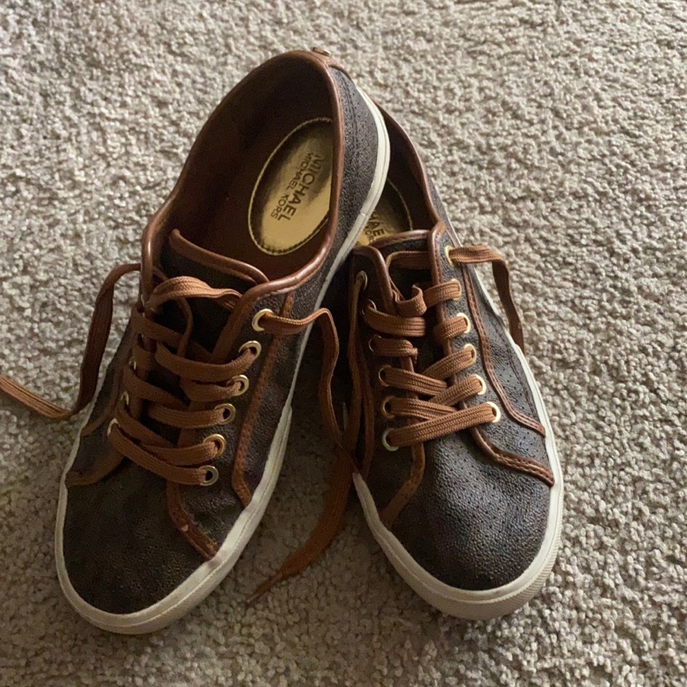Michael Kors leather sneakers.